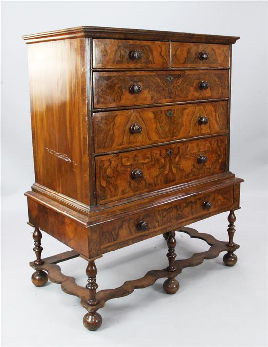 A mid 18th century banded walnut chest on stand, W. 3ft 6.5in. D. 2ft. H. 4ft 4.5in.